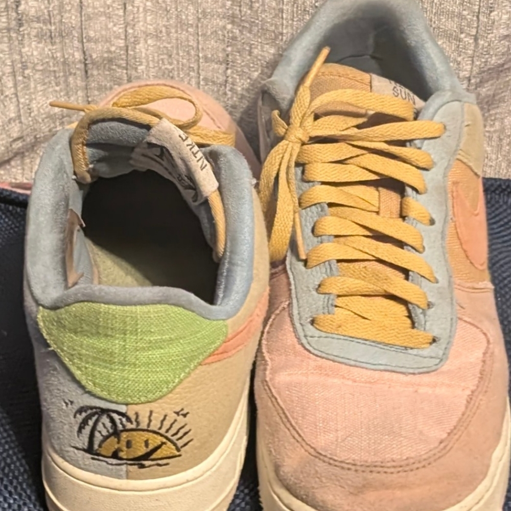 Colorful Nike Sun Club Low Tops with Embroidered Design